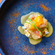 Image for article titled You can make shrimp and grits in 15 minutes—just use popcorn